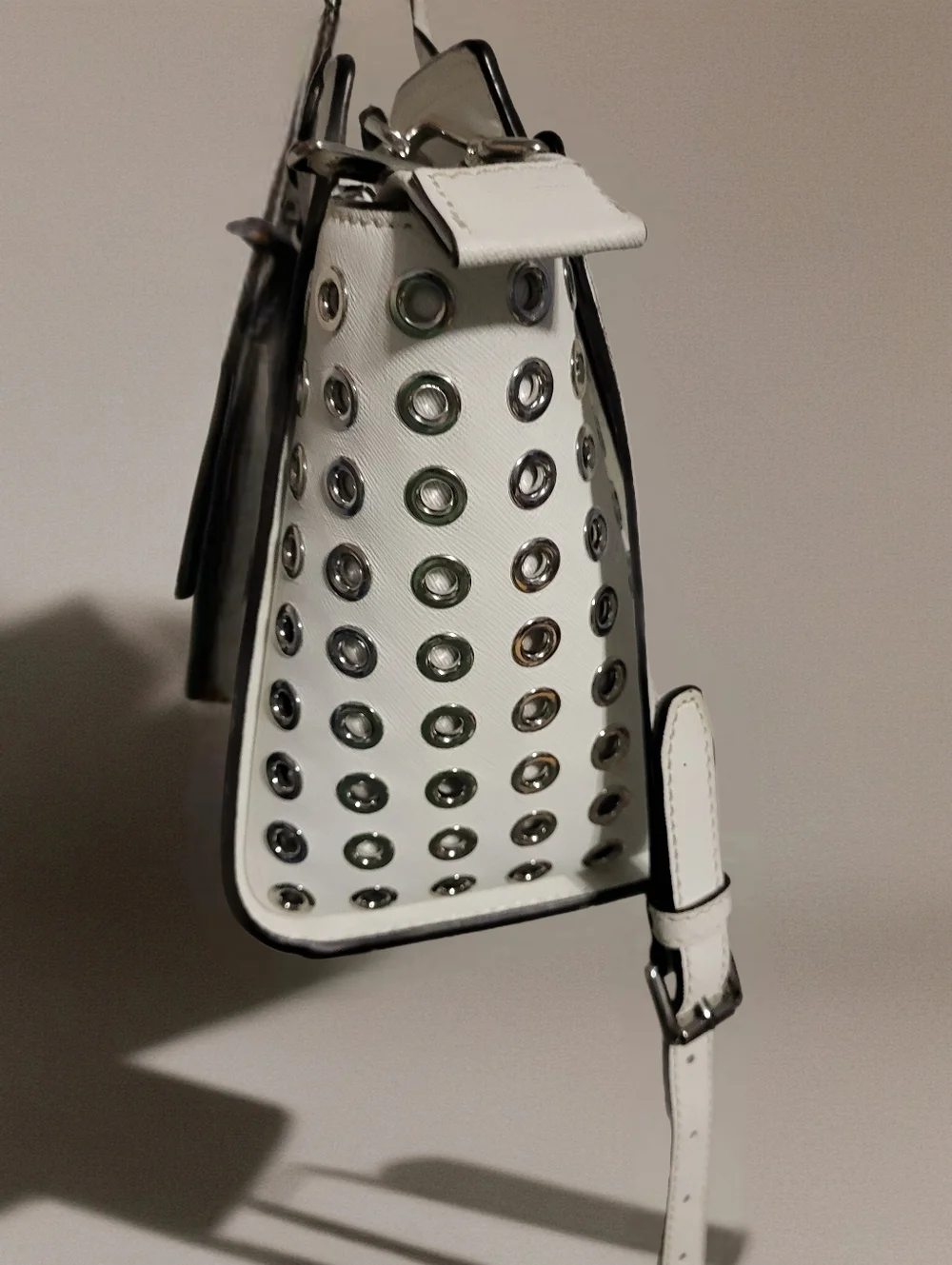 Michael Kors White Leather Satchel with Silver Metal Grommets.